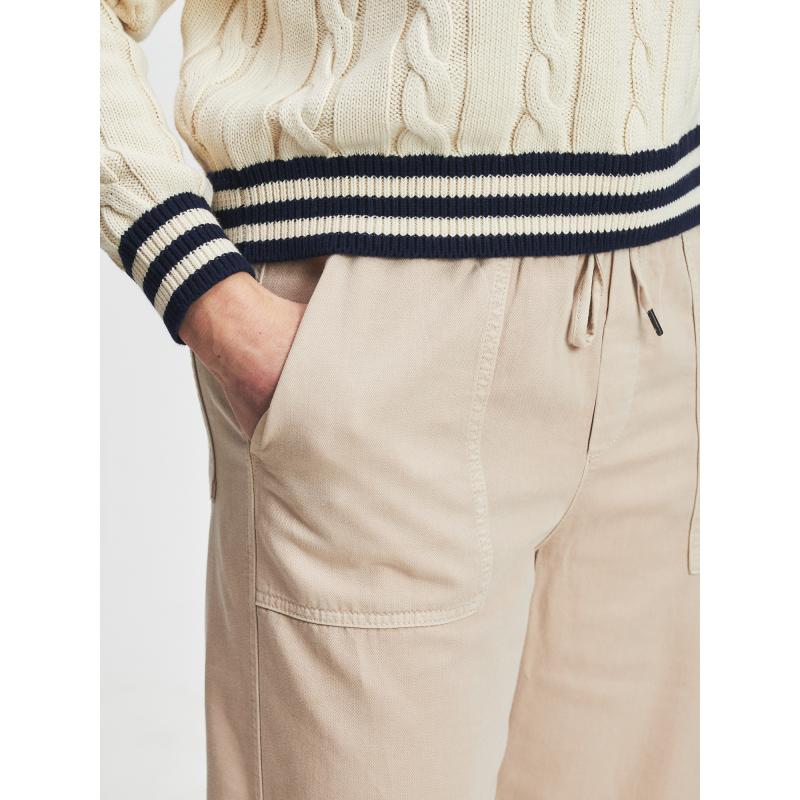 Široké kombinované nohavice