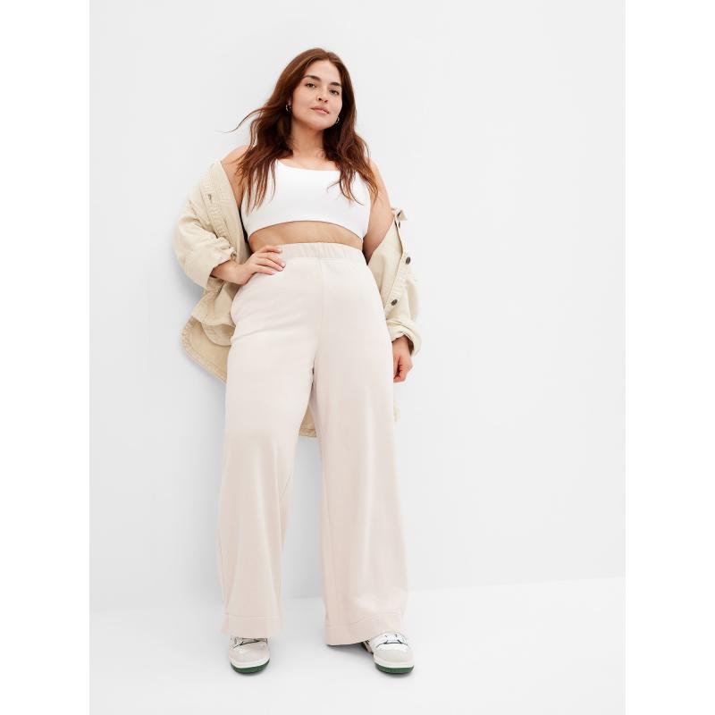 Egyenes, magasan felsliccelt melegítőnadrág