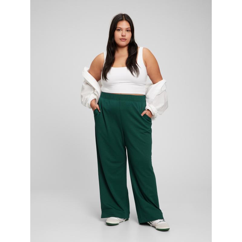 Széles szárú, egyenes, magasan felhúzott melegítőnadrág