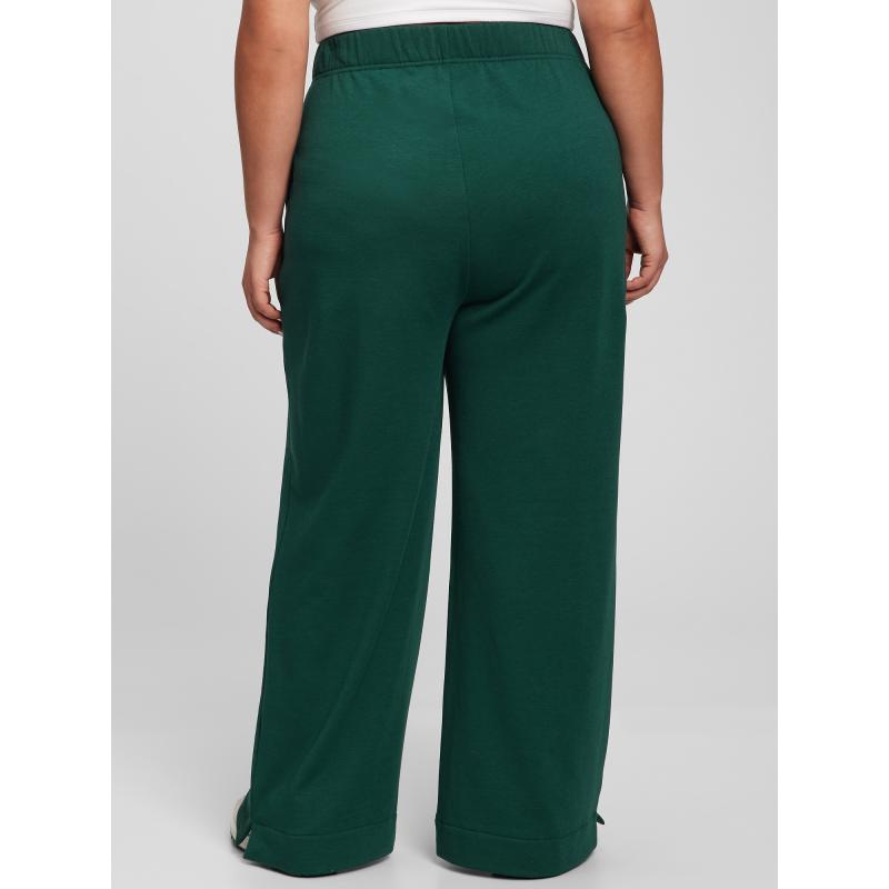 Széles szárú, egyenes, magasan felhúzott melegítőnadrág