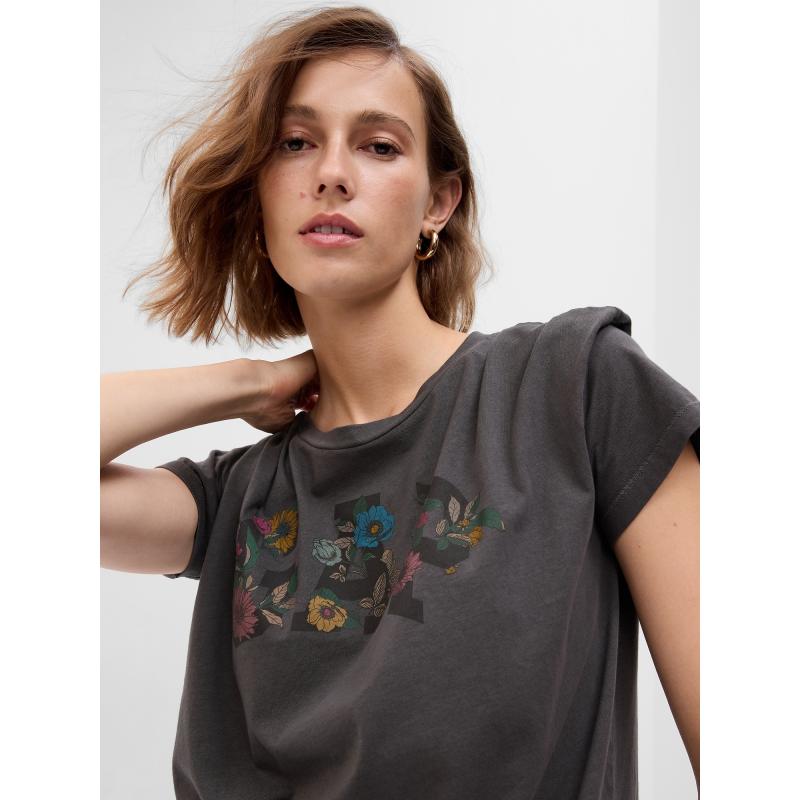 Póló virágos logóval