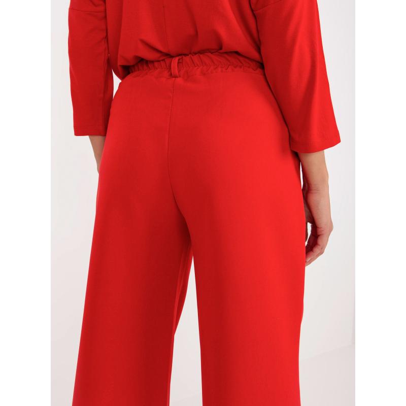 Dámske nohavice so záhybmi STANIA červená