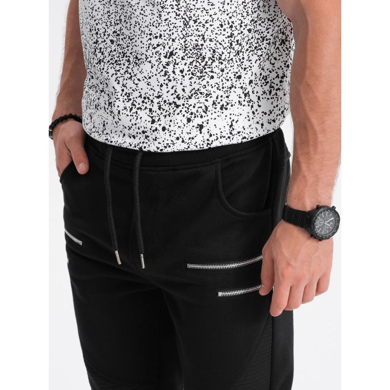 Pánske tepláky s ozdobnými zipsami V6 OM-PASK-22FW-012 čierne