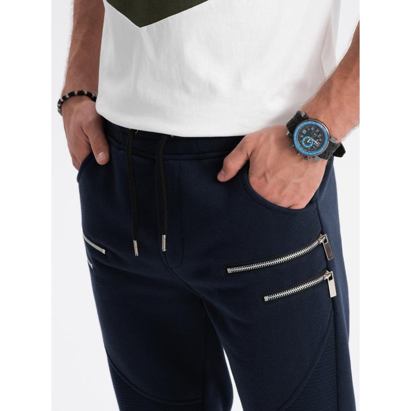 Pánske tepláky s ozdobnými zipsami V5 OM-PASK-22FW-012 tmavomodré