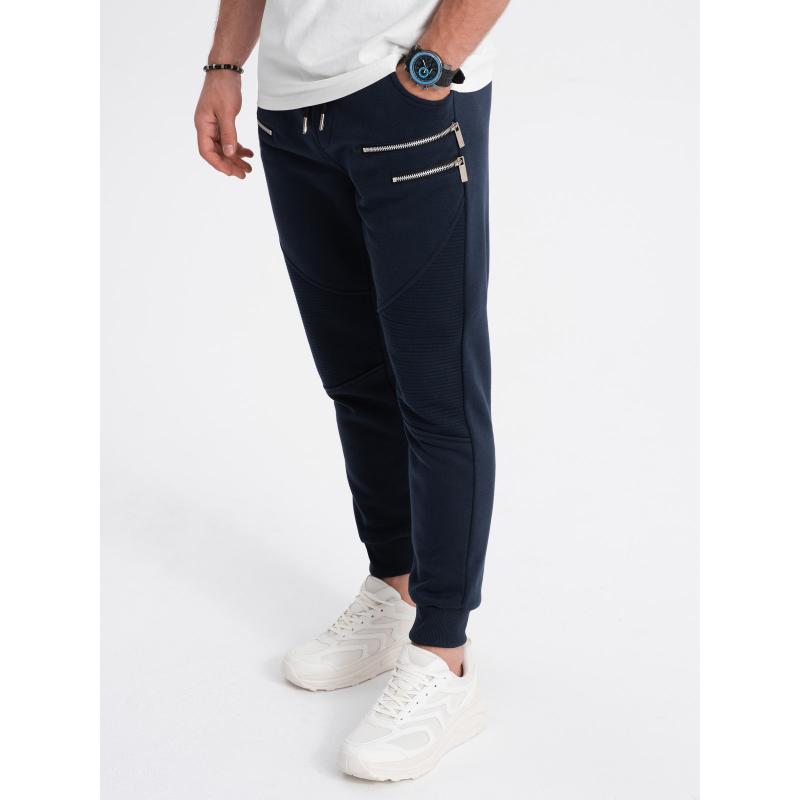 Pánske tepláky s ozdobnými zipsami V5 OM-PASK-22FW-012 tmavomodré