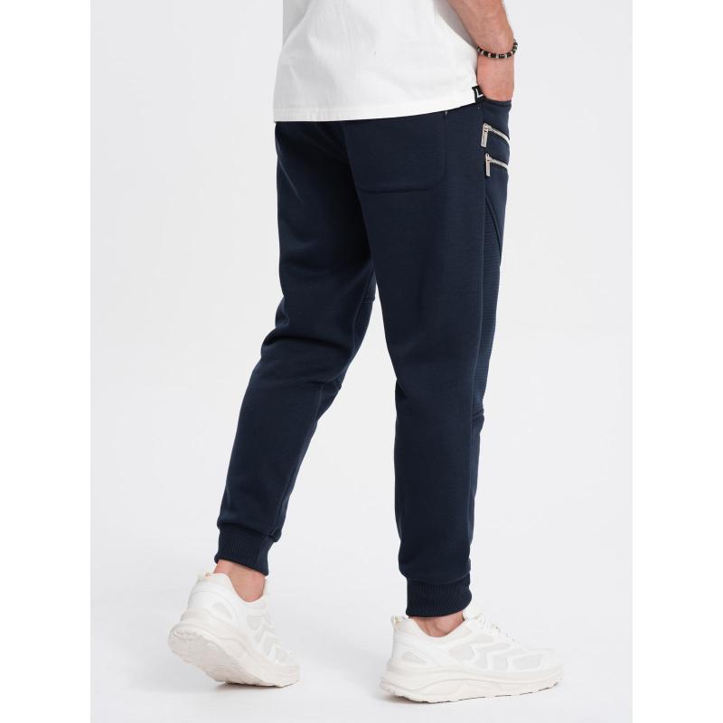 Pánske tepláky s ozdobnými zipsami V5 OM-PASK-22FW-012 tmavomodré