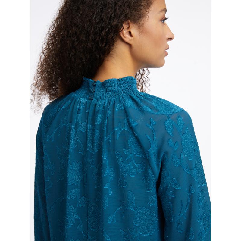 Modrá dámska vzorovaná blúzka