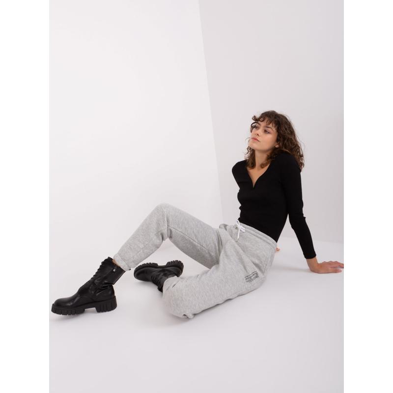 Dámske tepláky s potlačou SUBLEVEL svetlosivé