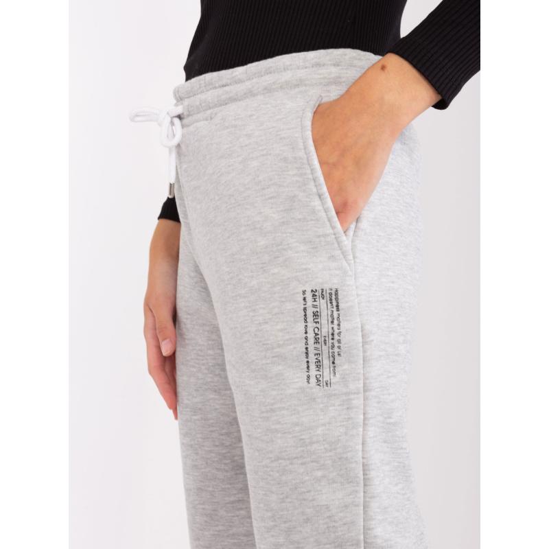 Dámske tepláky s potlačou SUBLEVEL svetlosivé