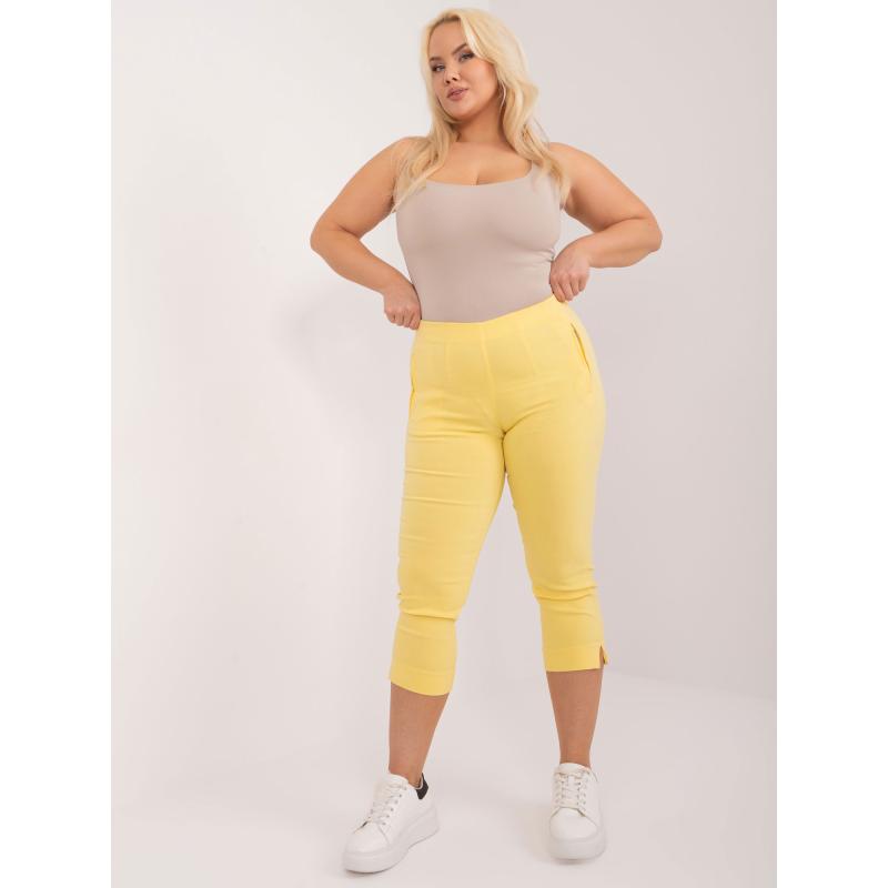 Dámské kalhoty s rozparky 3/4 plus size ROMA světle žluté