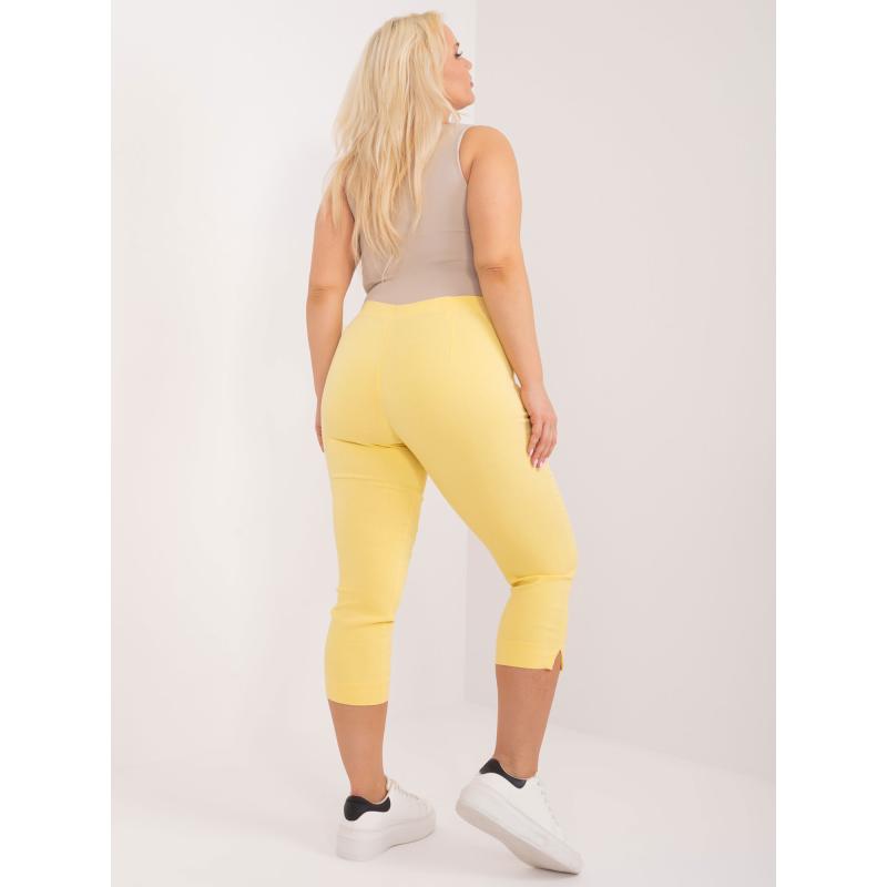 Dámské kalhoty s rozparky 3/4 plus size ROMA světle žluté