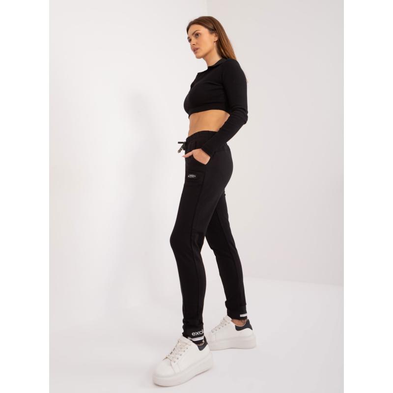 Női melegítőnadrág bordás szegéllyel fekete