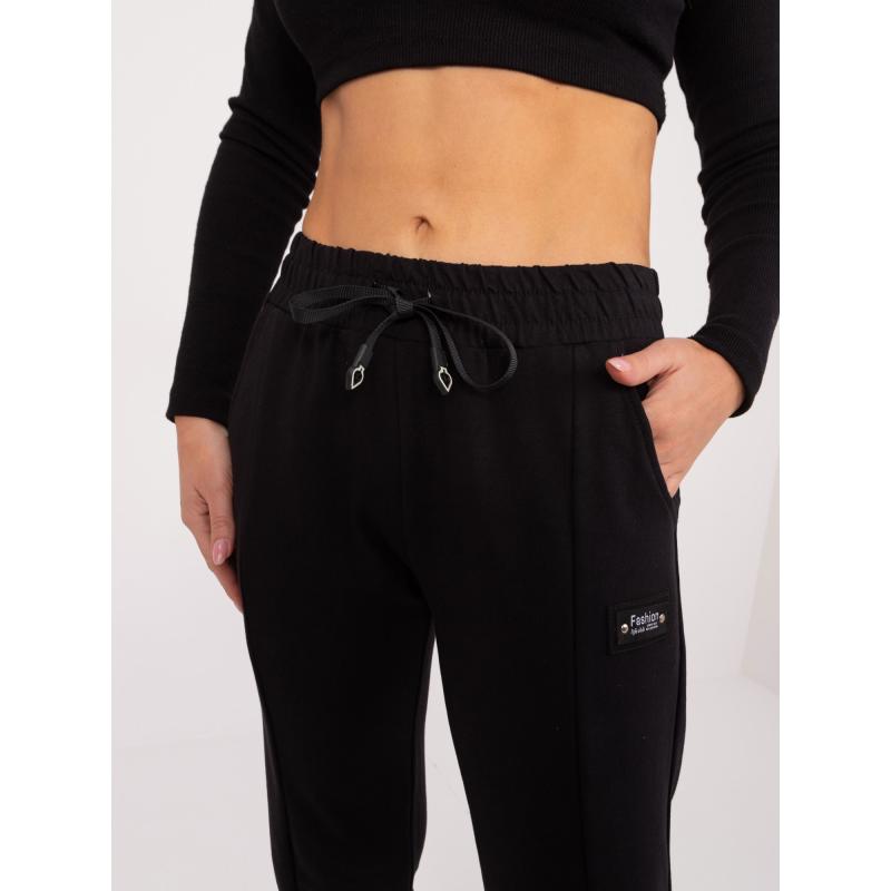 Női melegítőnadrág bordás szegéllyel fekete