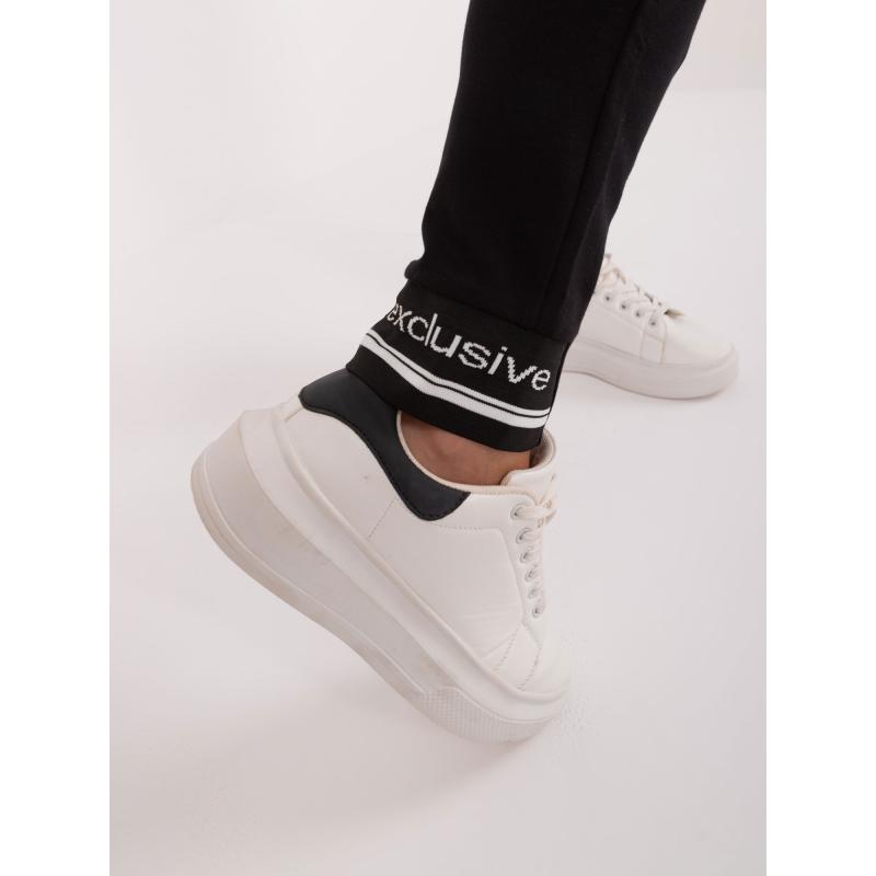 Női melegítőnadrág bordás szegéllyel fekete