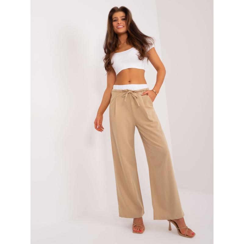 Dámské kalhoty s kapsami hnědé