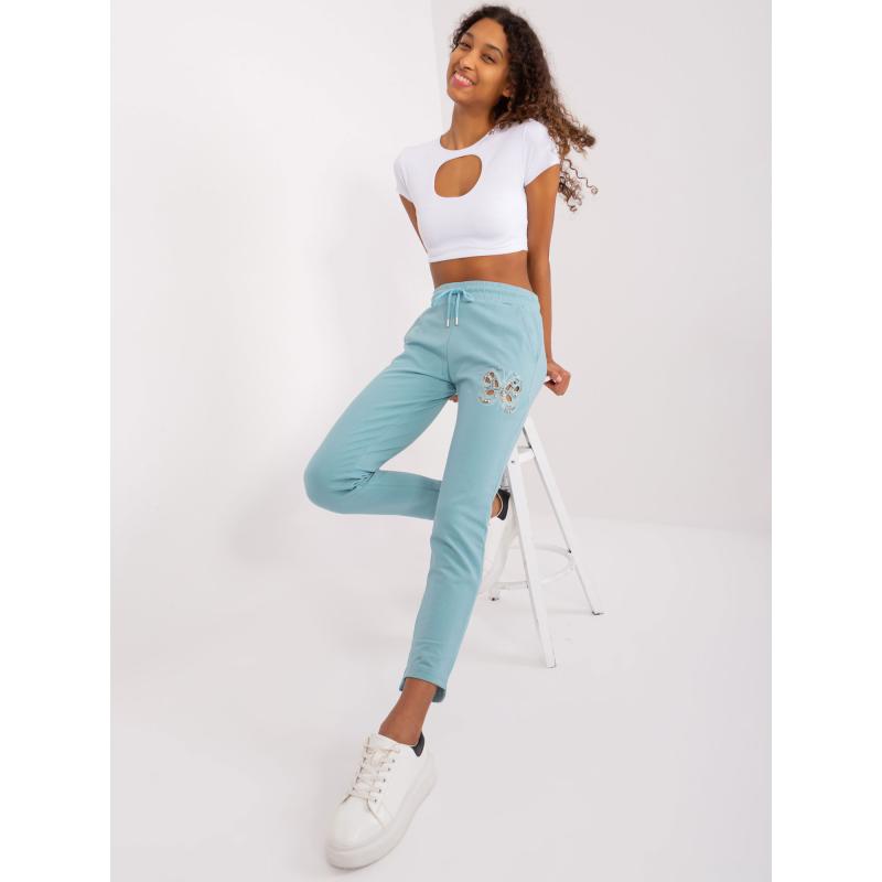 Dámské tepláky s kapsami pistáciové