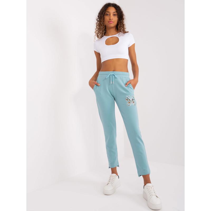 Dámské tepláky s kapsami pistáciové