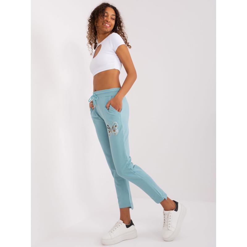 Dámské tepláky s kapsami pistáciové