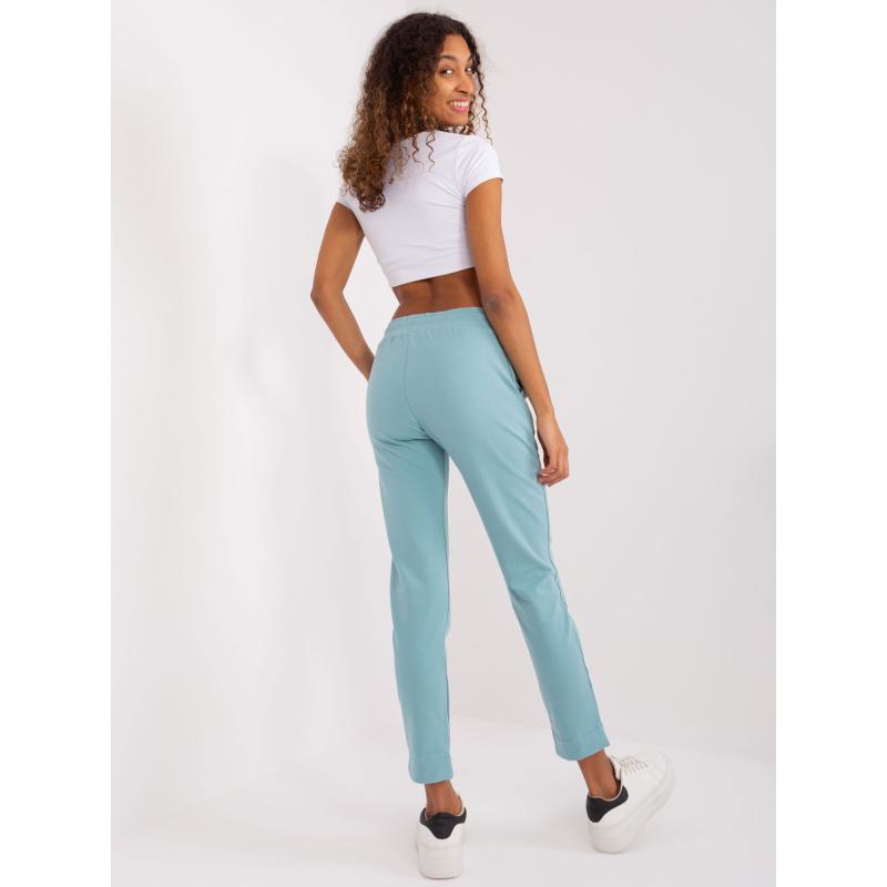 Dámské tepláky s kapsami pistáciové