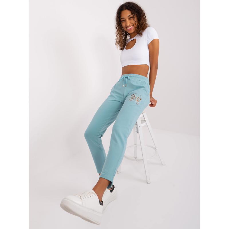 Dámské tepláky s kapsami pistáciové