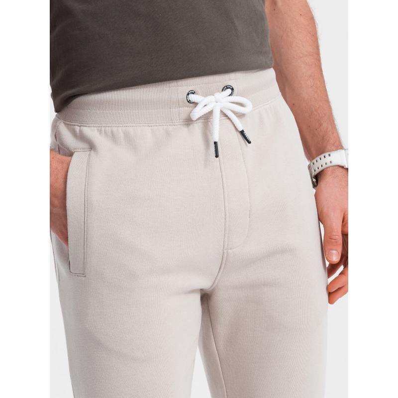 Pánské tepláky V1 OM-PABS-0206 světle béžové 