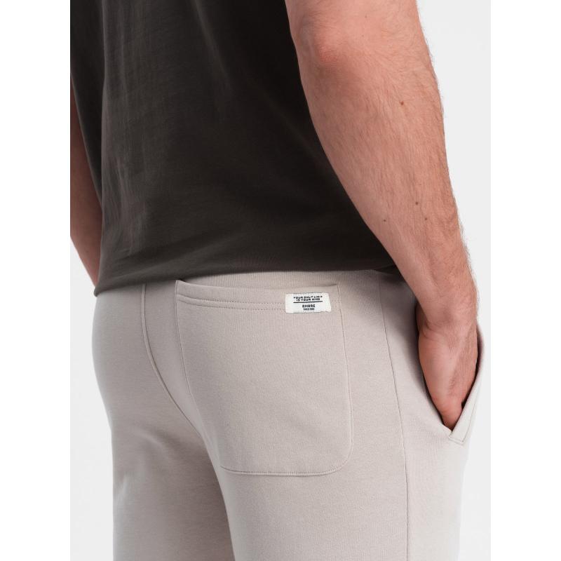 Pánské tepláky V1 OM-PABS-0206 světle béžové 