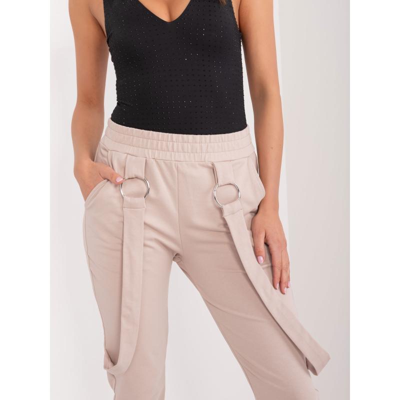 Női melegítőnadrág zsebekkel bézs színű