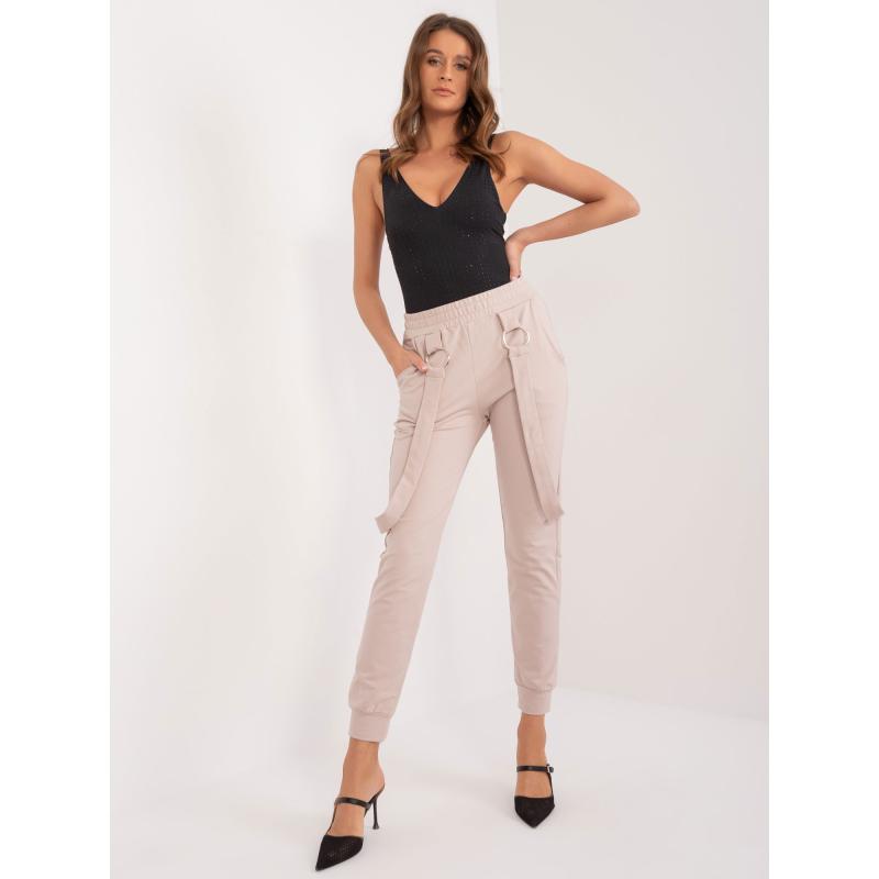 Női melegítőnadrág zsebekkel bézs színű