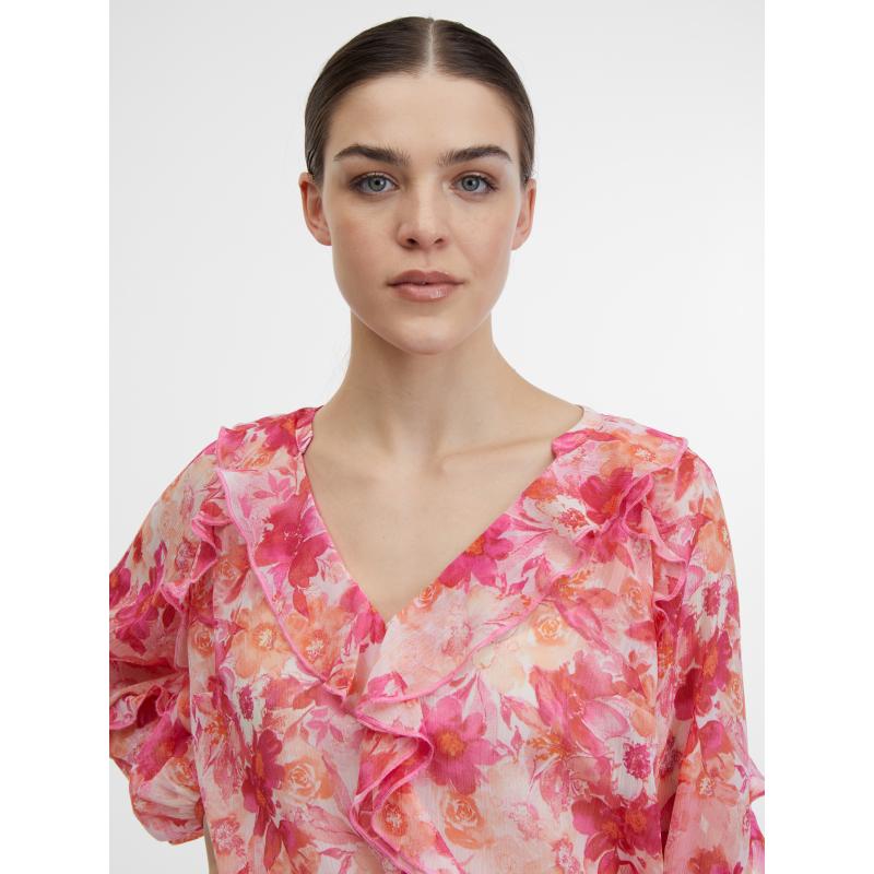Rózsaszín női blúz virágokkal