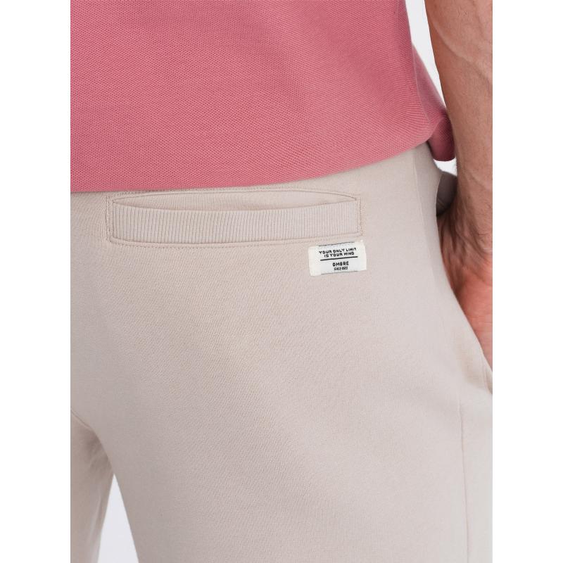 Pánske pletené šortky so sťahovacou šnúrkou a vreckami svetlo béžová