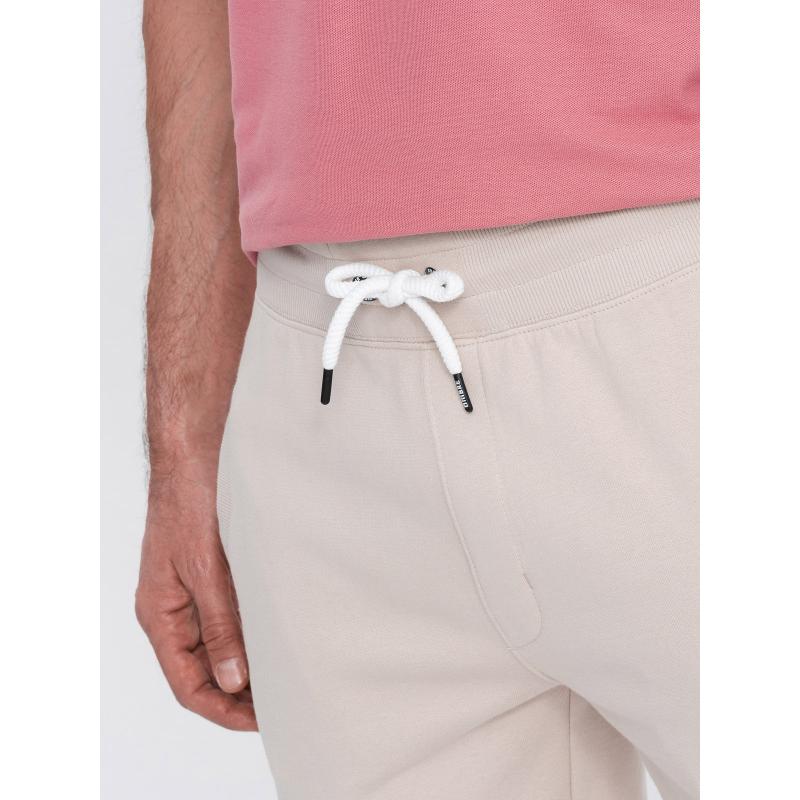 Pánske pletené šortky so sťahovacou šnúrkou a vreckami svetlo béžová