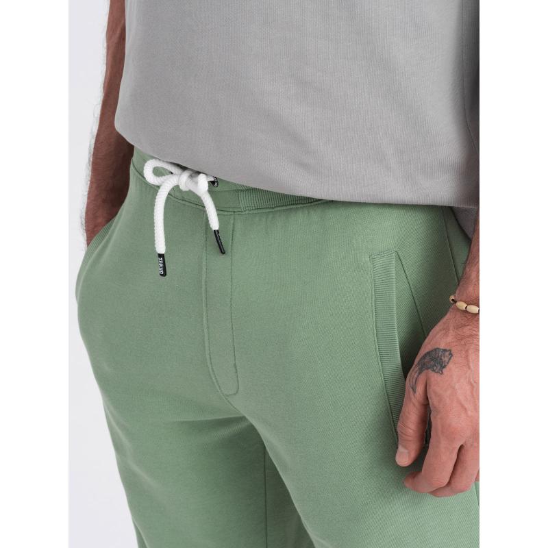 Férfi kötött rövidnadrág húzózsinórral és zsebekkel zöld