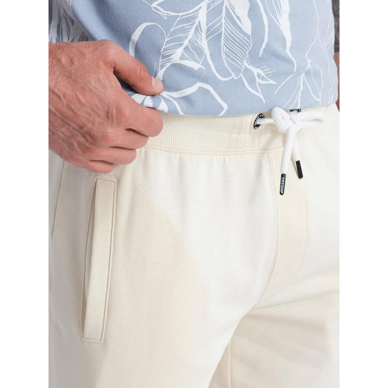 Pánské pletené šortky se stahovací šňůrkou a kapsami krémové 