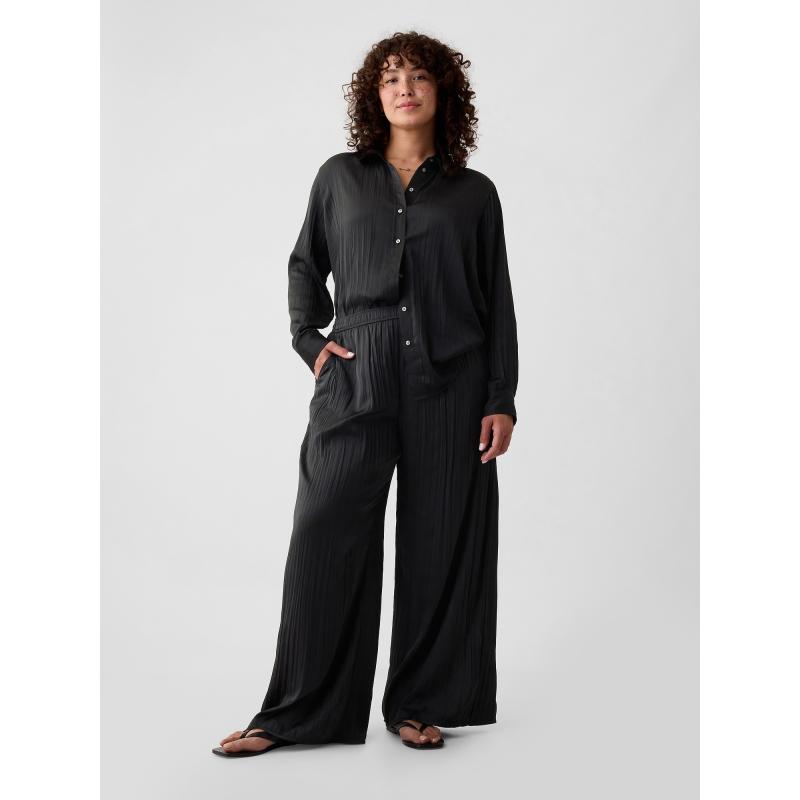 Nohavice z lisovaného saténu