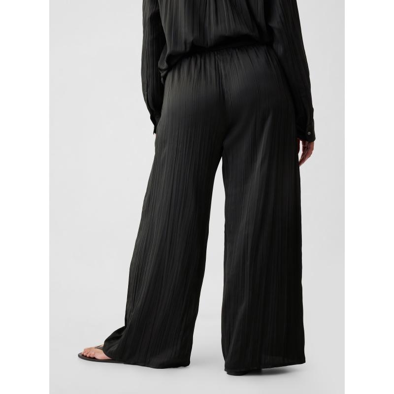 Nohavice z lisovaného saténu