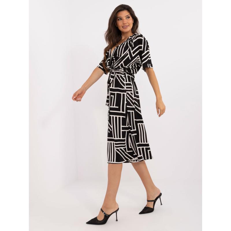 Dámský overal se zavazováním na zádech vzorovaný černý 