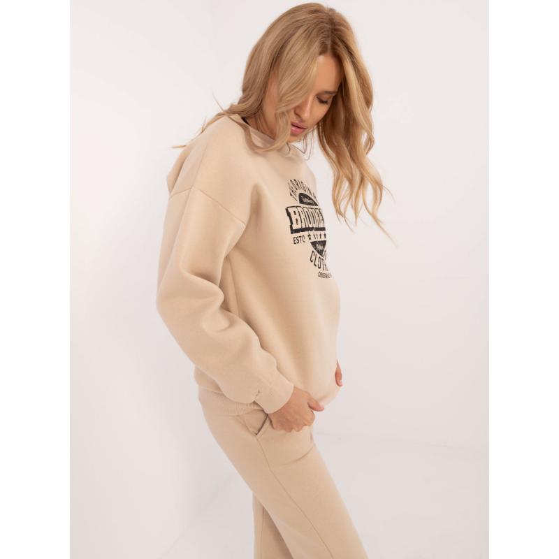 Női túlméretezett pulóver bézs színű nyomtatással