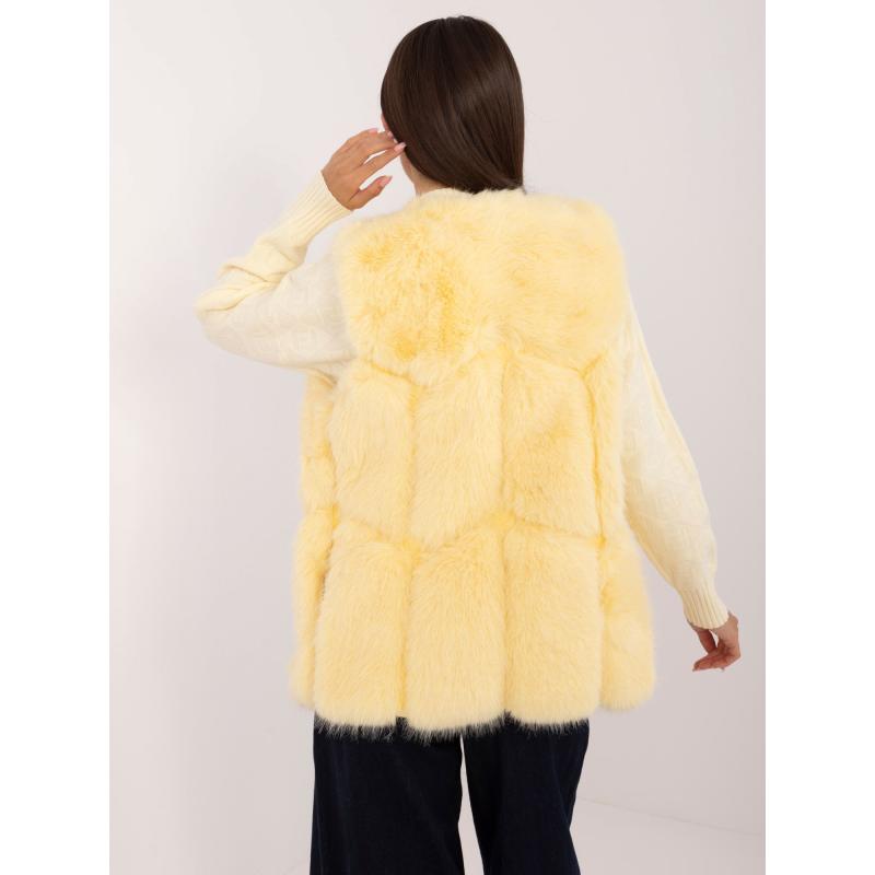 Dámská vesta s kožešinovou podšívkou světle žlutá 