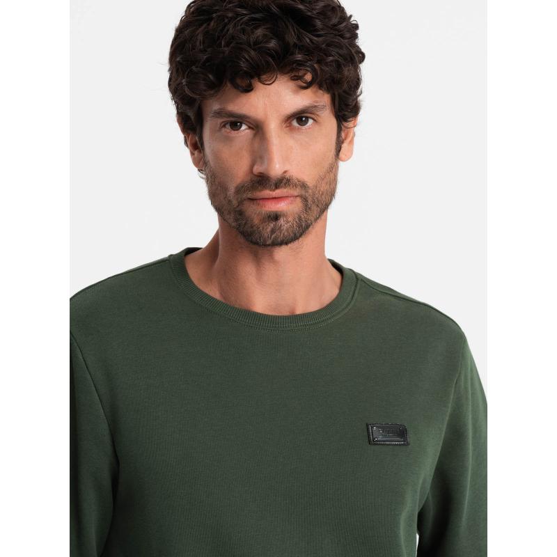 Férfi melegítőfelső fém kitűzővel sötétzöld