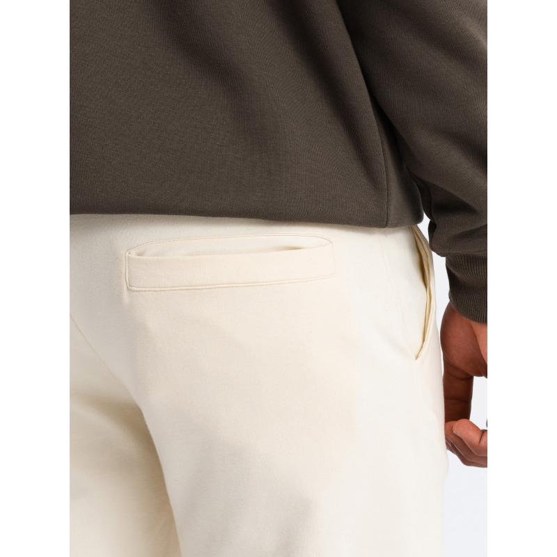 Pánské tepláky s logem krémové 