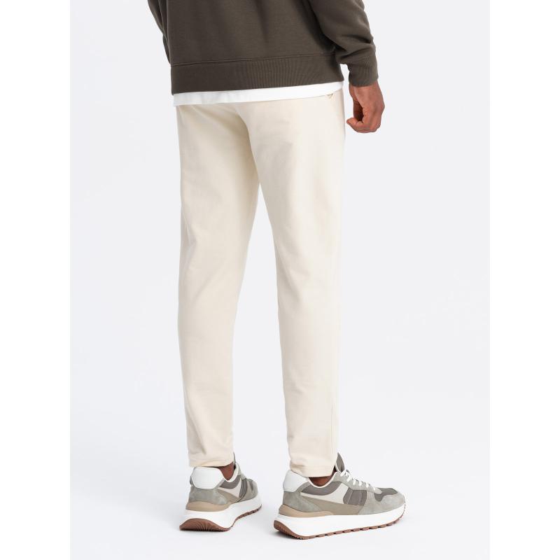 Pánské tepláky s logem krémové 