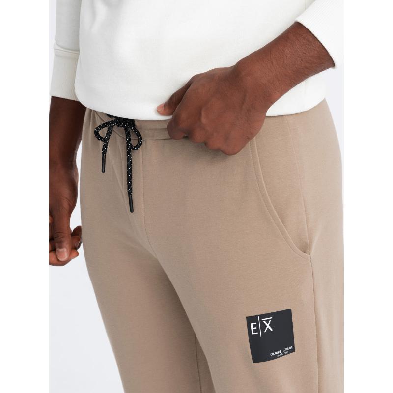 Férfi logós melegítőnadrág barna színben