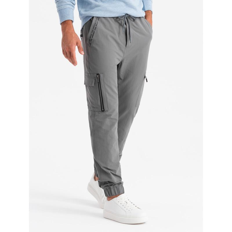 Pánské tepláky s cargo kapsami a potiskem - šedé