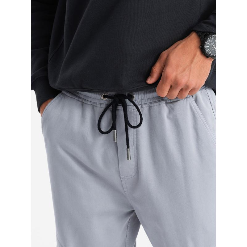 Pánské pletené tepláky s nákladovými kapsami - světle šedé