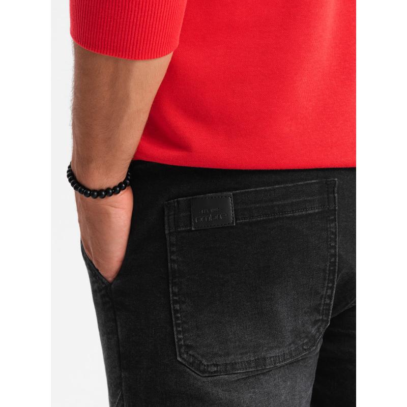 Pánské džínové tepláky s asymetrickým prošíváním - černé