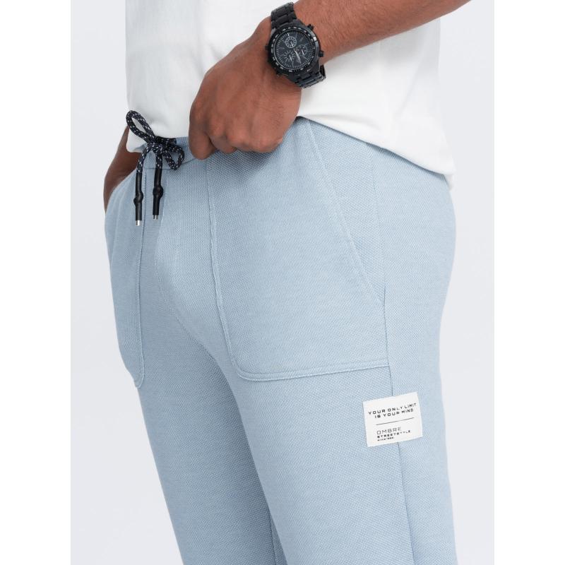 Férfi texturált kötött melegítőnadrág - világoskék V4