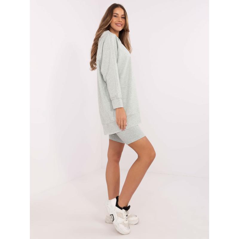 Světle zelená melanžová souprava s pruhovanými legínami