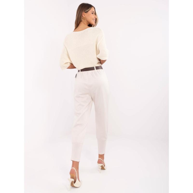 Světle béžové dámské tepláky s laclem