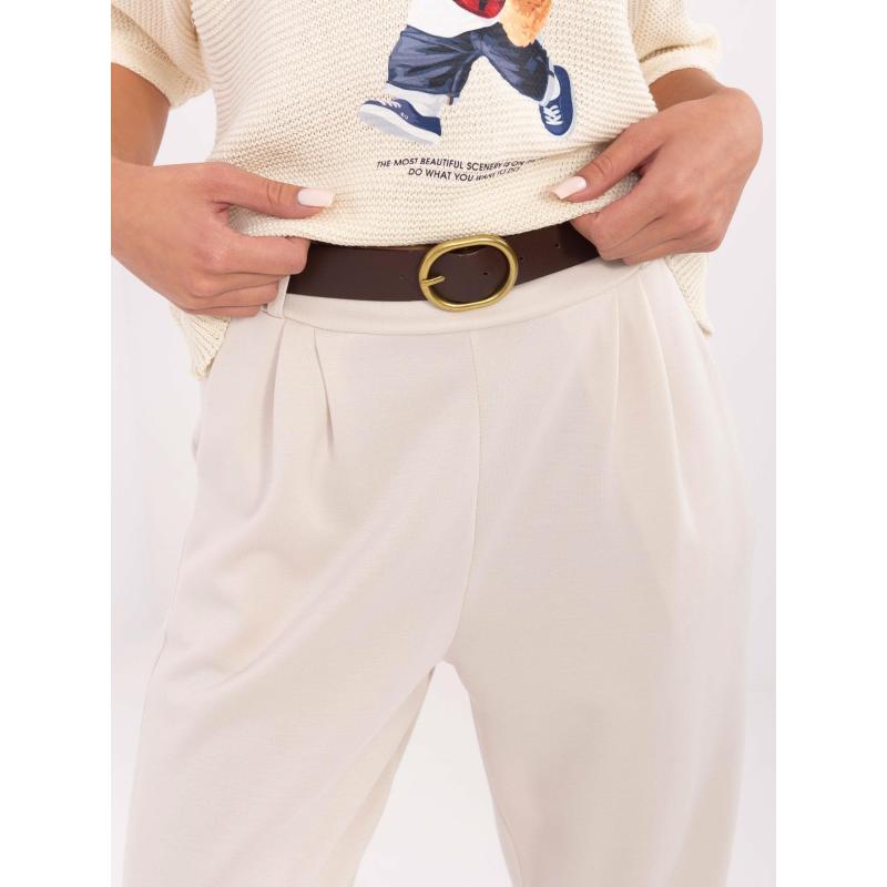 Světle béžové dámské tepláky s laclem