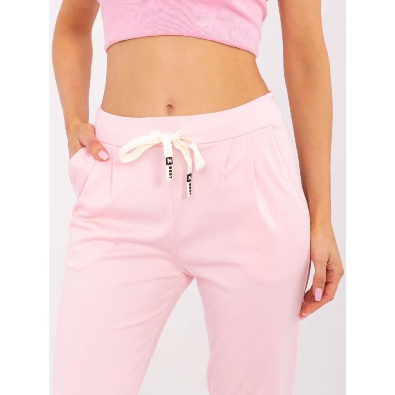 Světle růžové teplákové kalhoty s kapsami